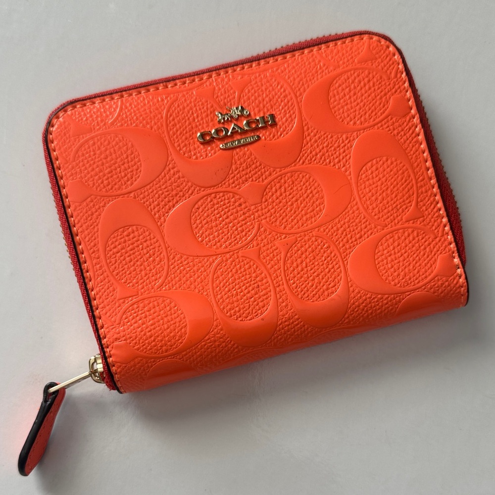 Coach Embossed Orange Wallet
